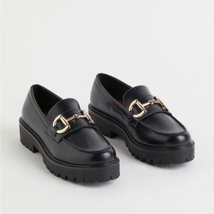 Black Loafers with Gold Detailing